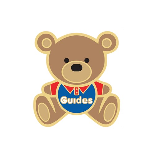 Bear shaped pin badge wearing Guides polo