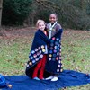 Brownie and Rainbow wrapped in Girlguiding blanket